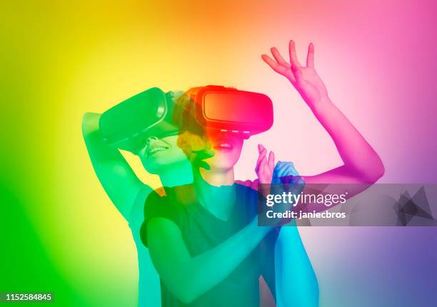 lgbt woman exploring virtual reality. double exposure - dating game stock pictures, royalty-free photos & images