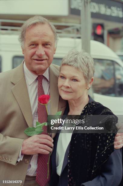 English actors Geoffrey Palmer and Judi Dench attend a photocall to launch the new series of the BBC Television sitcom 'As Time Goes By' in London in...