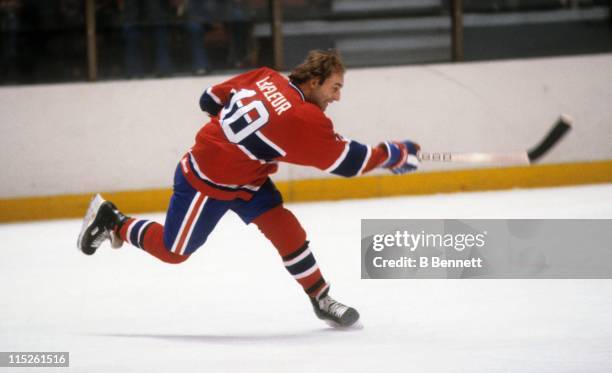 Guy Lafleur of the Montreal Canadiens takes a slap shot during an NHL game circa 1976.