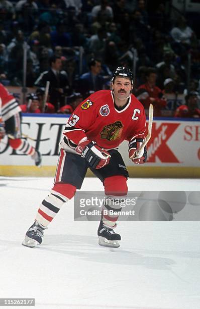 Dirk Graham of the Chicago Blackhawks skates on the ice during an NHL game against the New York Islanders circa 1991 at the Nassau Coliseum in...