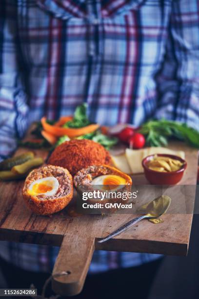 british scotch eggs with mustard - scotch egg stock pictures, royalty-free photos & images