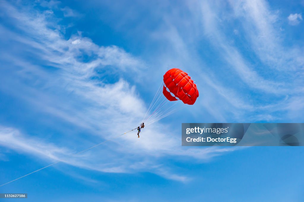 Tourist Parachuting at Karon Beach, Phuket, Thailand