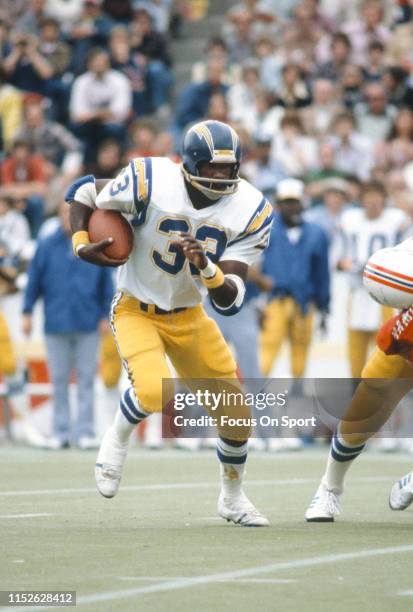 Don Woods of the San Diego Chargers carries the ball against the New England Patriots during an NFL football game October 1, 1978 at Schaefer Stadium...