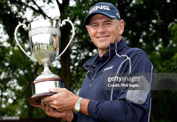 Peter Fowler of Australia poses with the trophy after the final round of the Handa Senior Masters presented by The Stapleford Forum played at...