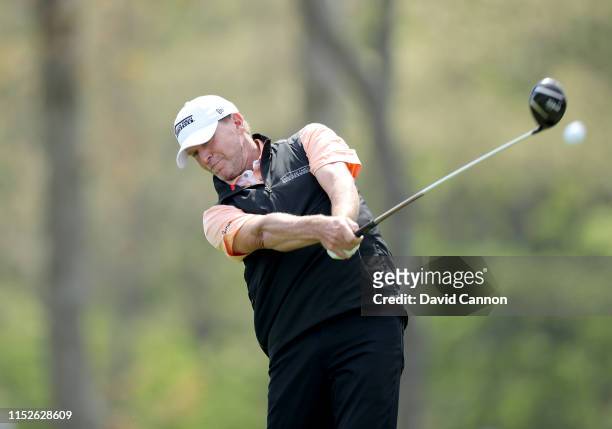Steve Stricker of the United States plays his tee shot on the 12th hole during the second round of the 2019 PGA Championship on the Black Course at...
