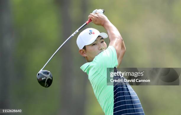 Sung Kang of South Korea plays his tee shot on the 12th hole during the second round of the 2019 PGA Championship on the Black Course at Bethpage...