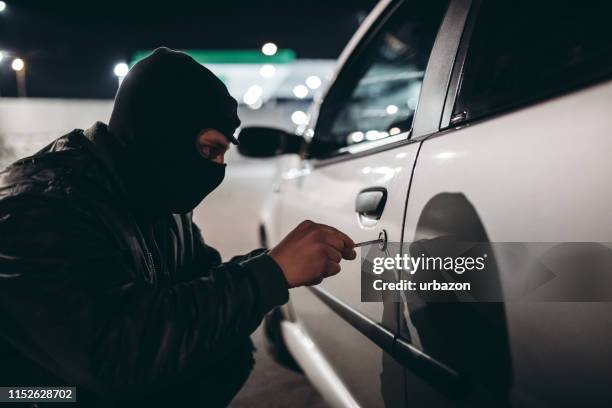 car jacking - thief stock pictures, royalty-free photos & images