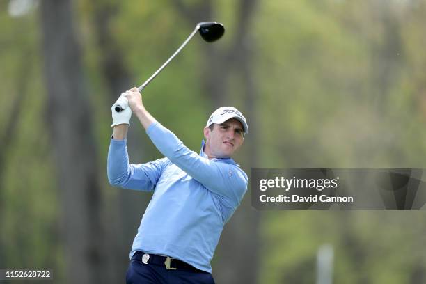 Alex Beach of the United States plays his tee shot on the 12th hole during the second round of the 2019 PGA Championship on the Black Course at...