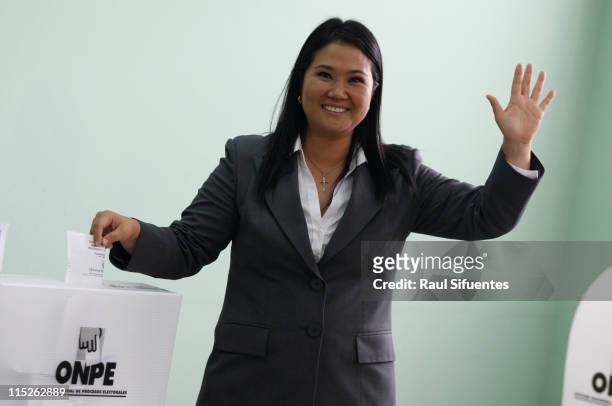 Peruvian presidential candidate Keiko Sofia Fujimori, from the party Fuerza 2011, greets after voting during the ballotage for president on June 05,...