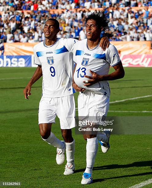 Carlo Costly and Jerry Bengston of Honduras celebrate after Costly's goal in the first half against El Salvador at Robertson Stadium on May 29, 2011...