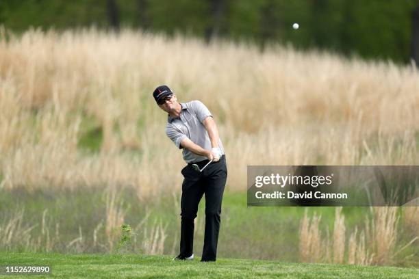 Zach Johnson of the United States plays his third shot on the 11th hole during the second round of the 2019 PGA Championship on the Black Course at...