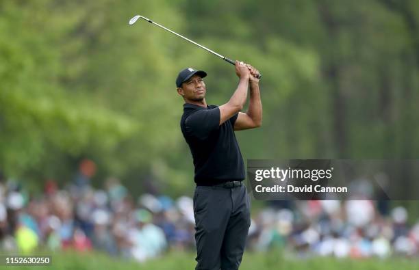 Tiger Woods of the United States plays his third shot on the fourth hole during the second round of the 2019 PGA Championship on the Black Course at...