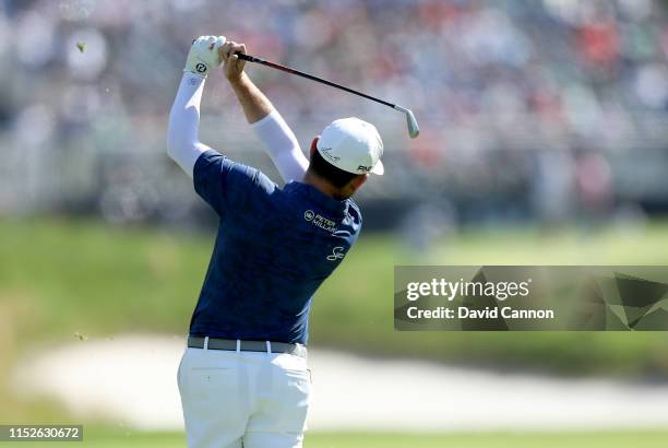 Louis Oosthuizen of South Africa plays his second shot on the 12th hole during the third round of the 2019 PGA Championship on the Black Course at...