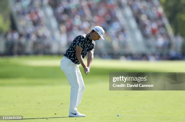 Justin Rose of England plays his second shot on the 12th hole during the third round of the 2019 PGA Championship on the Black Course at Bethpage...