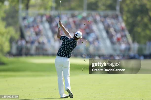 Justin Rose of England plays his second shot on the 12th hole during the third round of the 2019 PGA Championship on the Black Course at Bethpage...