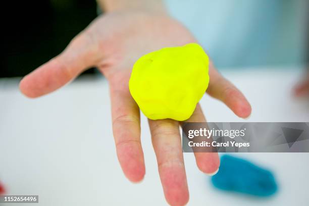 child hand plays clay - aerial view of childs playground stock pictures, royalty-free photos & images