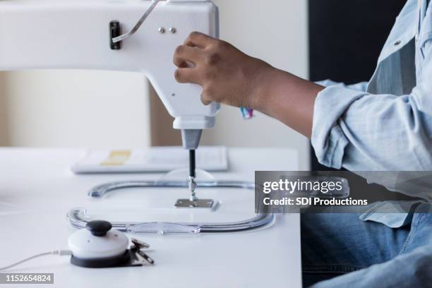 207 Boy Sewing Machine Stock Photos, High-Res Pictures, and Images ...