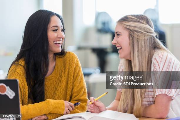 best friends studying for science test - cute college girl stock pictures, royalty-free photos & images