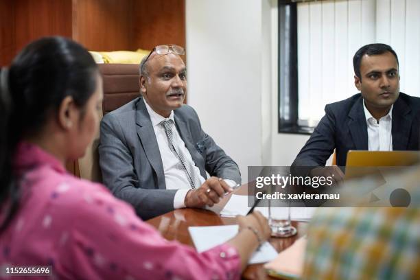 indian ceo meeting with senior management - mumbai business stock pictures, royalty-free photos & images