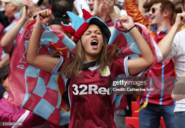 Aston Villa fans celebrate during the Sky Bet Championship Play-off Final match between Aston Villa and Derby County at Wembley Stadium on May 27,...