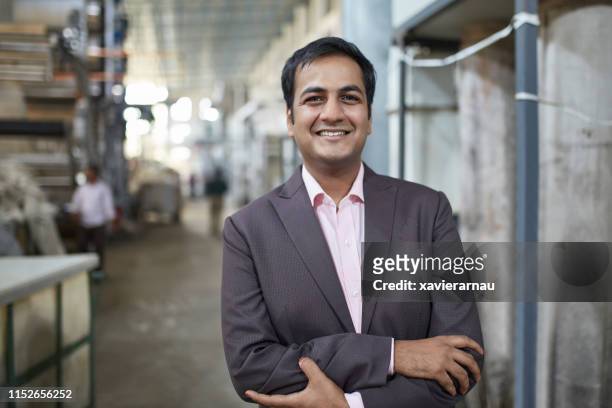 portrait of a smiling indian manufacturing manager - mumbai business stock pictures, royalty-free photos & images
