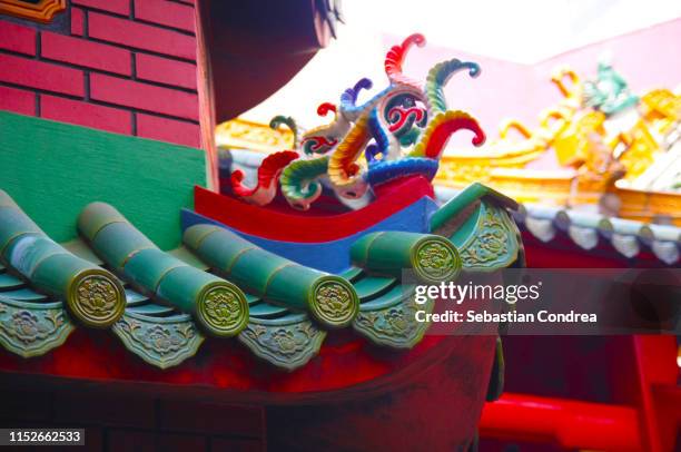 part of the roof guandi temple, kuala lumpur, malaysia. - socialist international stock pictures, royalty-free photos & images