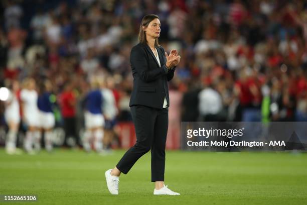 Dejected The head coach / manager of France Corinne Diacre applauds the fans at full time during the 2019 FIFA Women's World Cup France Quarter Final...