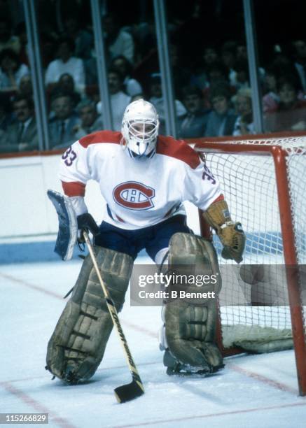 Goalie Patrick Roy of the Montreal Canadiens defends the net during an NHL playoff game in May, 1986 at the Montreal Forum in Montreal, Quebec,...