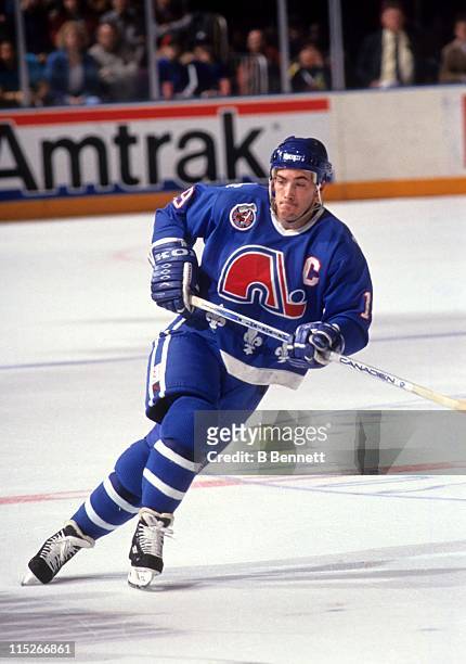 Joe Sakic of the Quebec Nordiques skates on the ice during an NHL game in March, 1993.