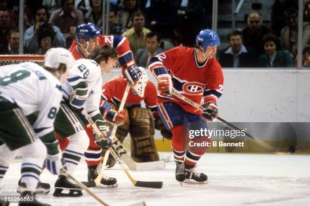 Steve Shutt and Bob Gainey of the Montreal Canadiens along with Pat Boutette and Ray Allison of the Hartford Whalers wait for the faceoff during...