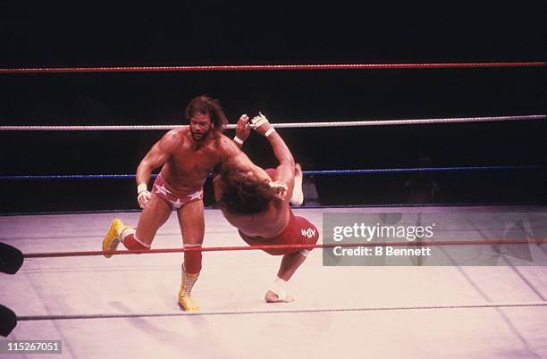 Randy "Macho Man" Savage closelines Sika during their WWF match circa 1987 at the Madison Square Garden in New York, New York.