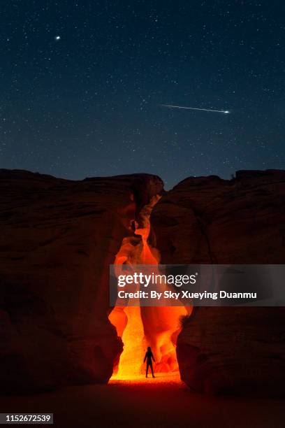 upper antelope canyon under milky way - antelope canyon stock pictures, royalty-free photos & images