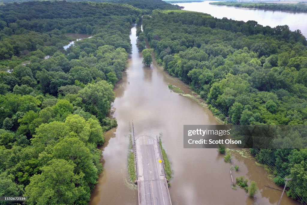 Midwest Rivers Reach Major Flood Stage At Historic Levels