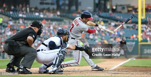 Trea Turner of the Washington Nationals breaks his bat during the fifth inning of the game against the Detroit Tigers at Comerica Park on June 28,...