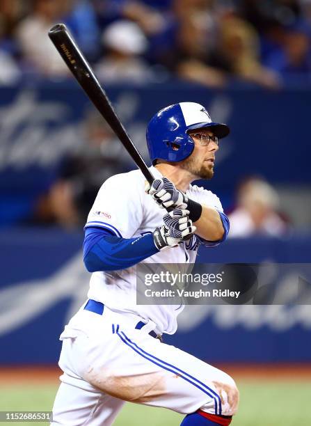 Eric Sogard of the Toronto Blue Jays hits a home run in the seventh inning during a MLB game against the Kansas City Royals at Rogers Centre on June...