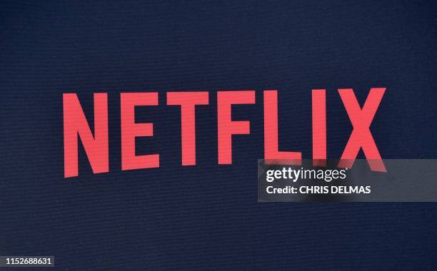 Netflix logo seen on the backdrop of Netflix's "Stranger Things 3" premiere at Santa Monica high school Barnum Hall on June 28, 2019 in Santa Monica,...