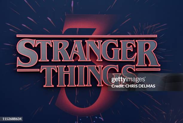 Stranger Things logo seen on the backdrop of Netflix's "Stranger Things 3" premiere at Santa Monica high school Barnum Hall on June 28, 2019 in Santa...