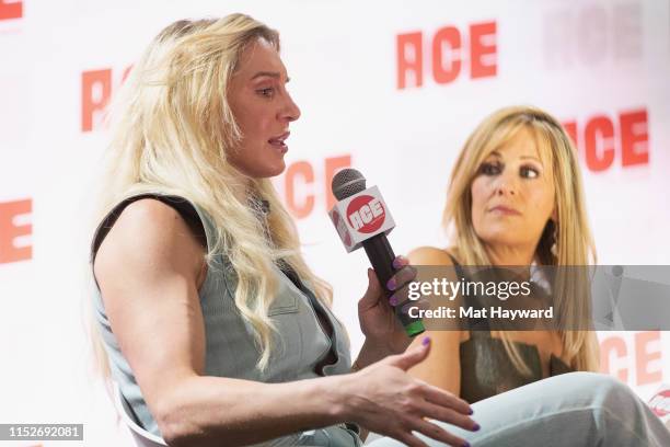 Charlotte Flair and Lilian Garcia of WWE speak onstage during ACE Comic Con at Century Link Field Event Center on June 28, 2019 in Seattle,...