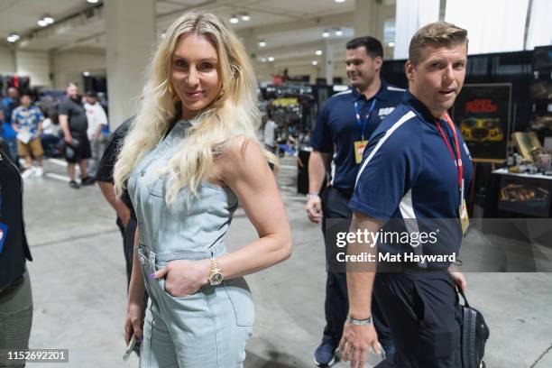 Superstar Charlotte Flair poses for a photo during ACE Comic Con at Century Link Field Event Center on June 28, 2019 in Seattle, Washington.