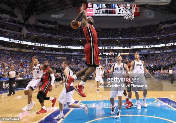 LeBron James of the Miami Heat dunks against Jason Kidd of the Dallas Mavericks in the second half of Game Three of the 2011 NBA Finals at American...