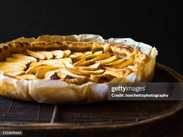 homemade apple pie on black background - apple pie stock pictures, royalty-free photos & images