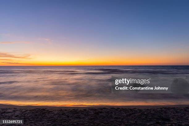 beach sunset background - kota kinabalu beach stock pictures, royalty-free photos & images