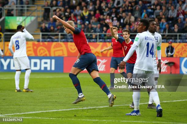 Erling Haaland of Norway celebrates after scoring his team's eighth goal during the 2019 FIFA U-20 World Cup group C match between Norway and...