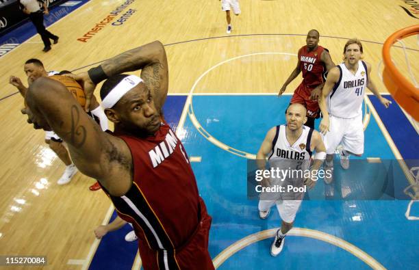 LeBron James of the Miami Heat dunks against the Dallas Mavericks in Game Three of the 2011 NBA Finals at American Airlines Center on June 5, 2011 in...