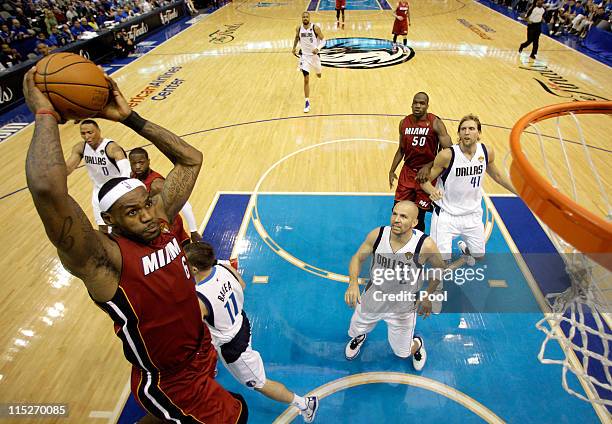 LeBron James of the Miami Heat dunks against the Dallas Mavericks in Game Three of the 2011 NBA Finals at American Airlines Center on June 5, 2011 in...