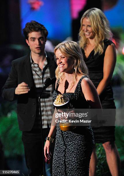 Actors Robert Pattinson and Reese Witherspoon and TV Personality Chelsea Handler speak onstage during the 2011 MTV Movie Awards at Universal Studios'...