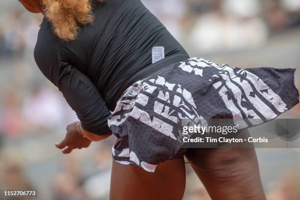 May 30. Serena Williams of the United States spent the entire match against Kurumi Nara of Japan with her clothing label hanging out of her back...