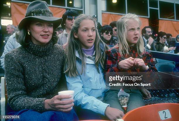 Wife Nancy Seaver and daughters Sarah and Anne Elizabeth Seaver of Cincinnati Reds pitcher Tom Seaver, watching the Reds play the New York Mets...