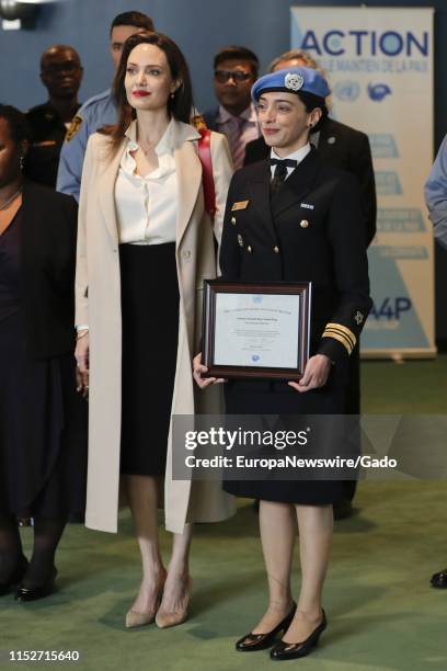 High Commissioner for Refugees Angelina Jolie and Brazilian Naval Officer Marcia Andrade Braga hold Gender Advocate of the Year Award at the United...