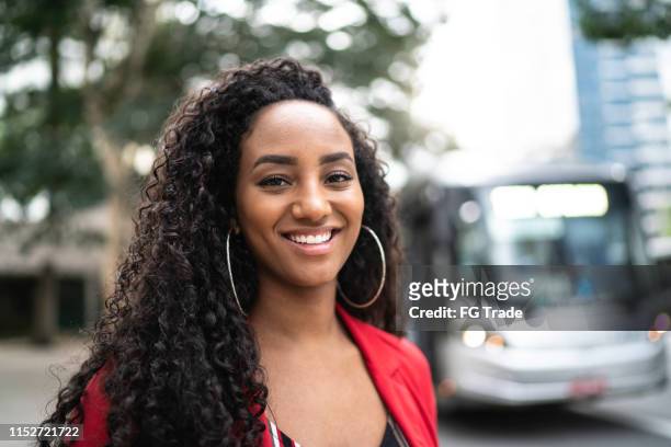 portrait of a latin woman in the street - pardo brazilian stock pictures, royalty-free photos & images